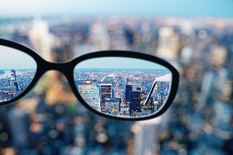 Close up of glasses in city