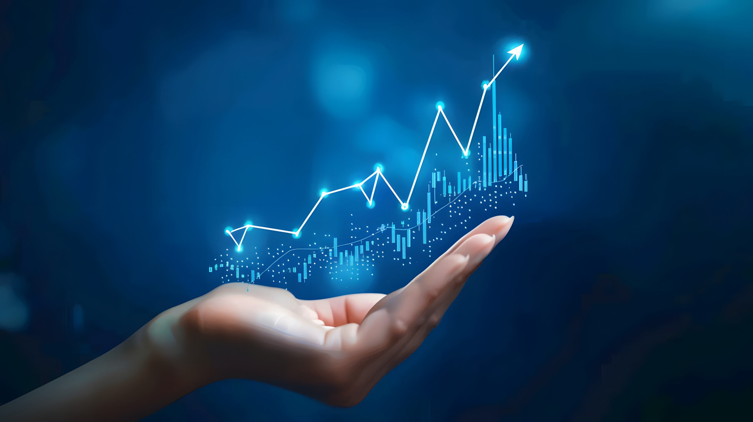 A hand holds a chart with a growing up arrow and a graph of stock market or business growth on a virtual screen